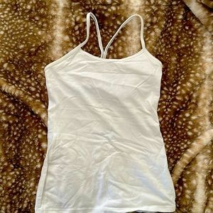 White lululemon athletic too with built in brac and in good condition